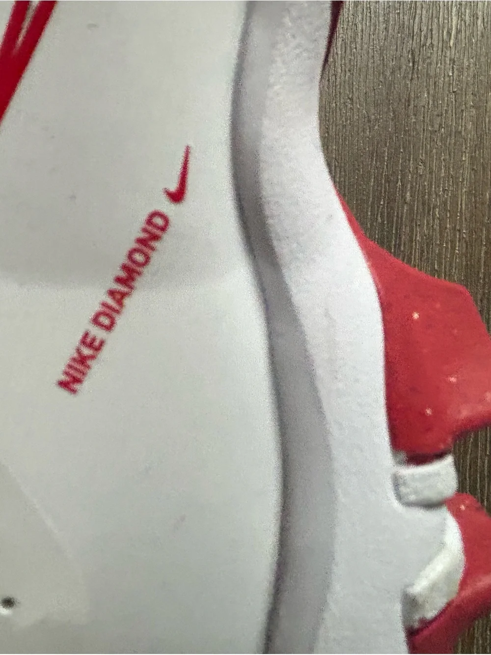 Nike Kids White cleats  with Red and Camo Accents